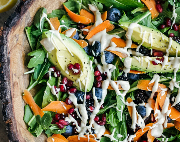 Wintery Greens with Avocado, Berries, Pistachios and Tahini Dressing